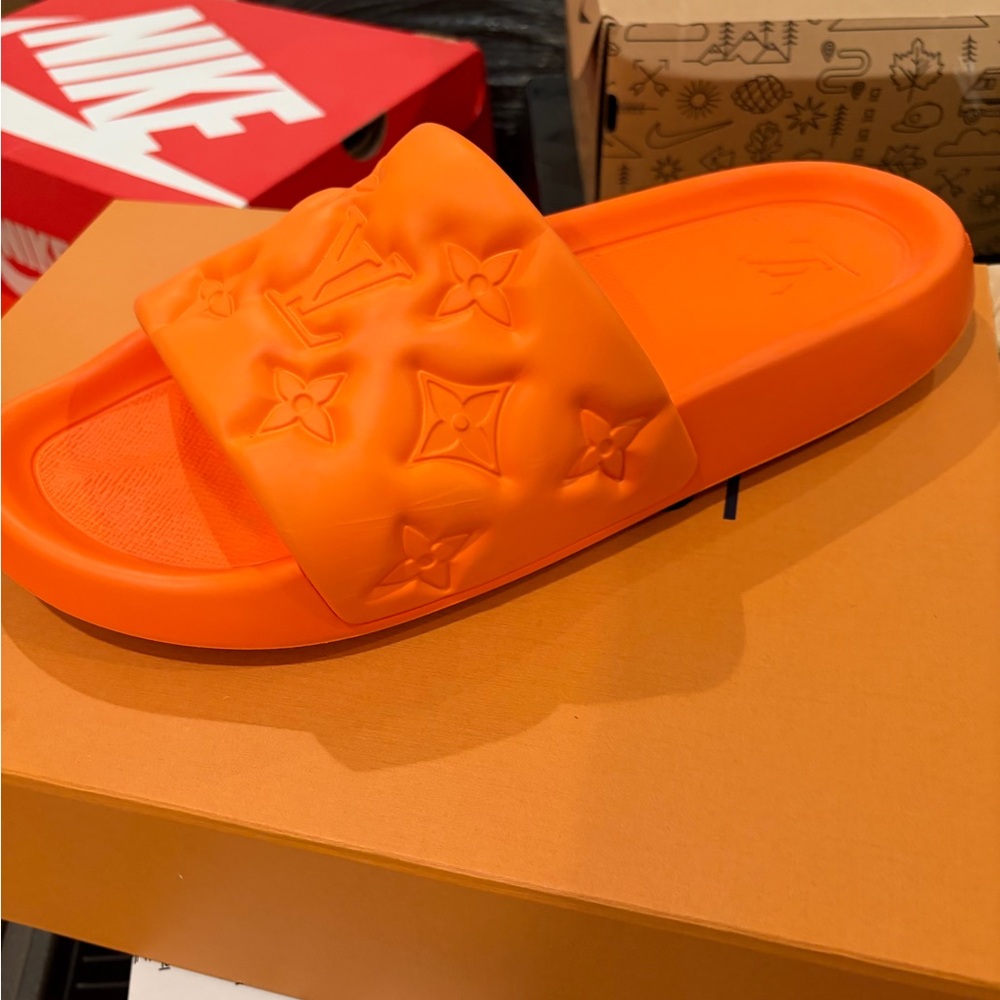 Louis Vuitton men’s Bright Orange Slide Sandals /
- read sizing